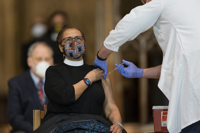 A pastor received the Johnson & Johnson COVID-19 vaccine in May, during a gathering of a group of interfaith clergy members, community leaders and officials at the Washington National Cathedral, to encourage faith communities to get the COVID vaccine.