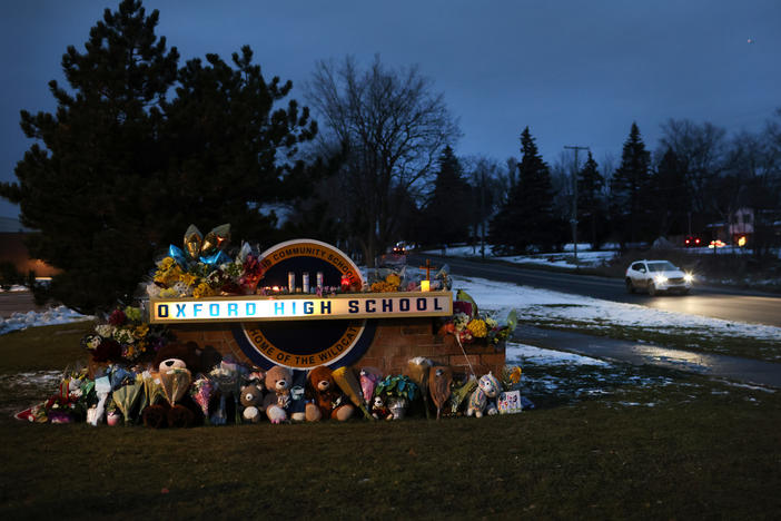 A makeshift memorial sits outside Oxford High School in Oxford, Mich., last week.