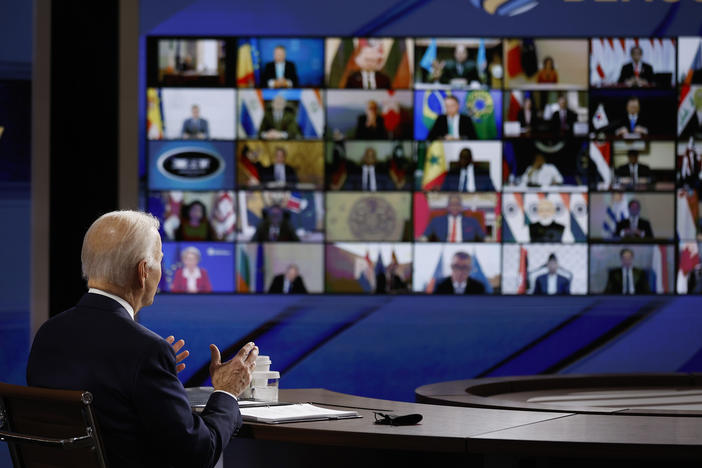 President Biden spoke to participants in the Summit for Democracy from a soundstage that the White House has set up for such virtual events.