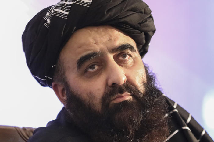 Amir Khan Muttaqi, the foreign minister in Afghanistan's new Taliban-run Cabinet, speaks at a September 2021 news conference in Kabul.