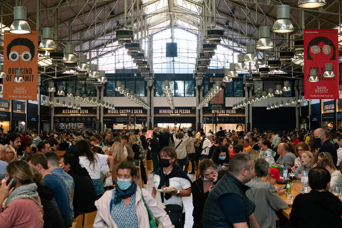 Costumers gather for food and drinks at Time Out Market in Lisbon, Portugal.