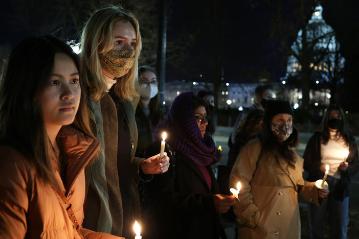 Activists participate in a candlelight vigil for abortion rights near the U.S. Supreme Court on Dec, 13, 2021 in Washington, D.C.