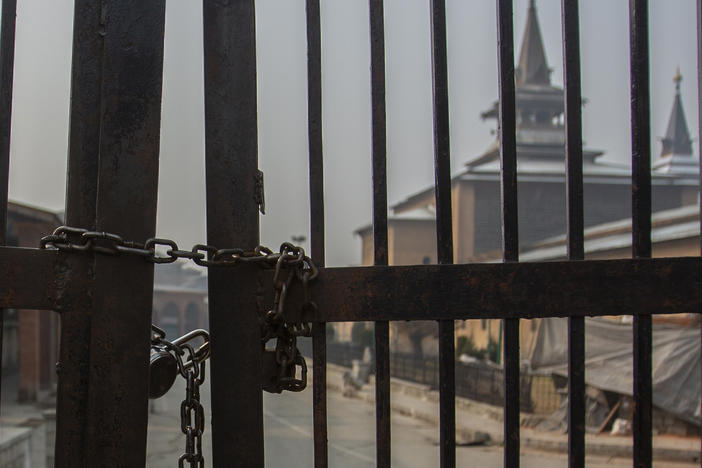 Kashmir's Jamia Masjid, or the grand mosque is seen through its gate that remains locked on Fridays in Srinagar, Indian controlled Kashmir.