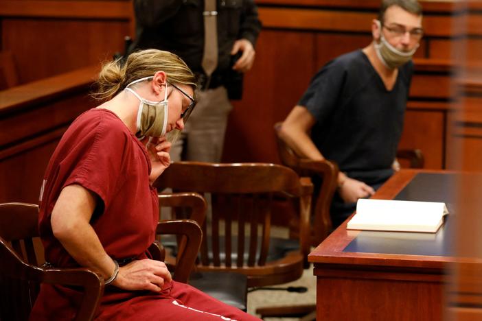 Jennifer Crumbley (L) and James Crumbley (R) appear in court for a probable cause conference in Rochester Hills, Michigan, on December 14, 2021.