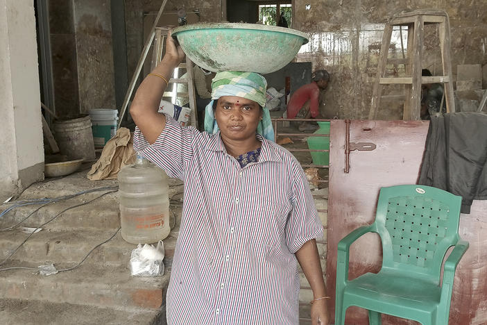 Selvi is a construction worker in Chennai, India. "My bones ache at night after carrying heavy loads through the day, my eyes sting from the dust and I cough often, but if I didn't do this, my kids and I would starve." she says.