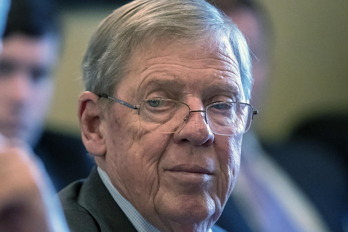In this Feb. 14, 2019 photo, Sen. Johnny Isakson, R-Ga., leads a meeting on Capitol Hill. Isakson, an affable Georgia Republican who rose from the ranks of the state legislature to become a U.S. senator, has died at age 76.