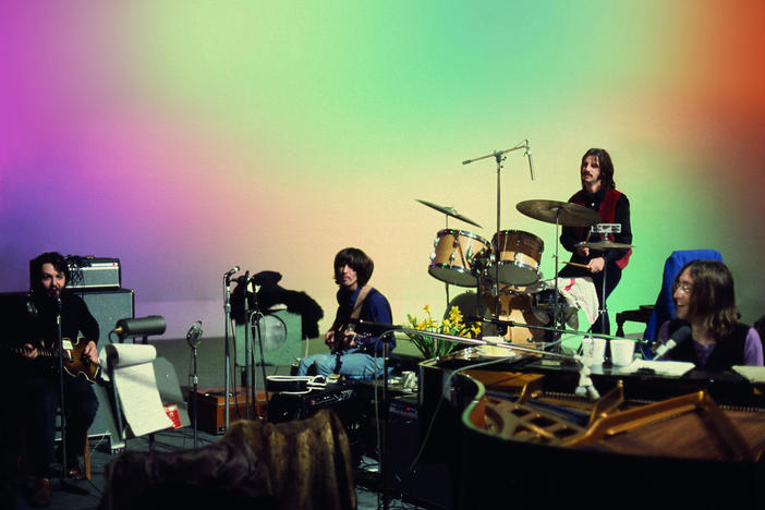 The Beatles on Mount Doom (or a still from Peter Jackson's <em>Get Back</em>, a documentary constructed from footage shot during the making of the band's last studio albums and final performance).