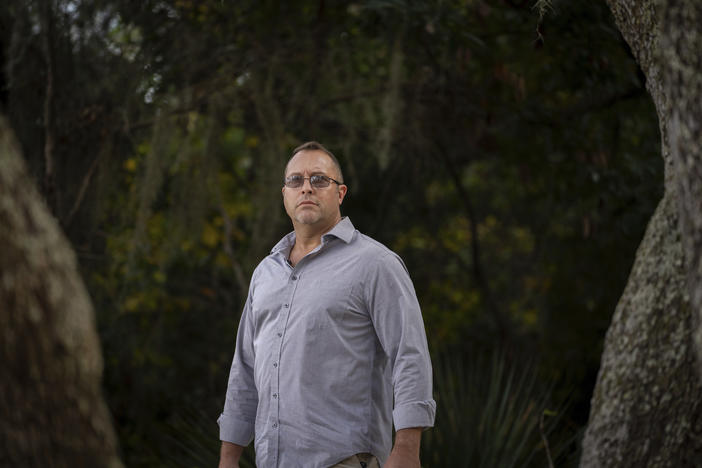 Joseph Moore stands for a portrait at a park in Jacksonville, Fla., earlier this month. Moore worked for nearly 10 years as an undercover informant for the FBI, infiltrating the Ku Klux Klan in Florida, foiling at least two murder plots, according to investigators, and investigating ties between law enforcement and the white supremacist organization.