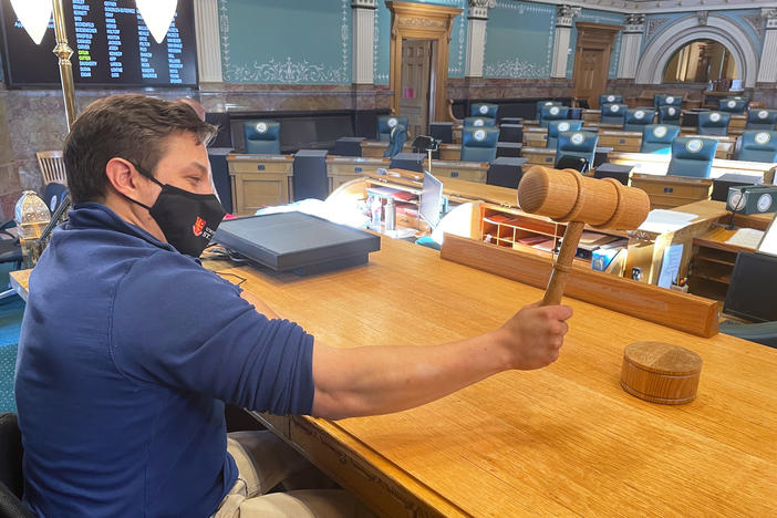 After serving a year in the state House as Colorado's first lawmaker to use a wheelchair, Democratic Rep. David Ortiz uses the new House chamber lift to get to the podium and slam the gavel for the very first time.