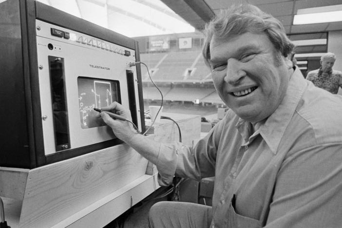 Former Oakland Raiders coach John Madden practices the electronic charting device telestrator on Jan. 21, 1982, for the Super Bowl broadcast on CBS. Madden, the Hall of Fame coach turned broadcaster, died Tuesday morning.