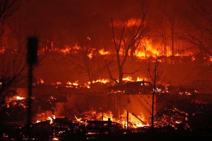 Dec. 30: Broomfield, Colo. — Homes burn as a wildfire rips through a development near Rock Creek Village.