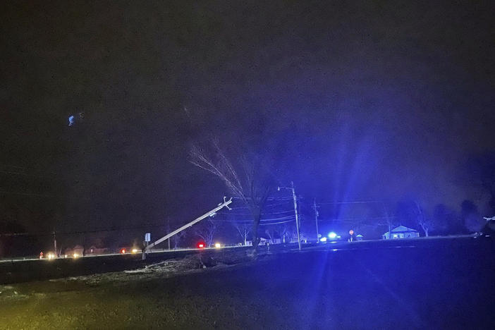 Authorities closed a road after power lines came down and homes suffered damage early Sunday, in Hazel Green, Ala. The storms followed a system earlier Saturday which brought a possible tornado and flooding to parts of Kentucky.