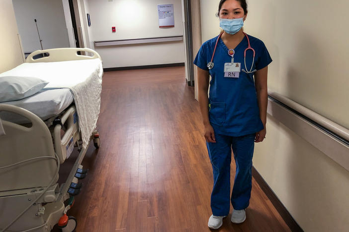 Mary Venus, a nurse from the Philippines, on duty at Billings Clinic in Billings, Mont.