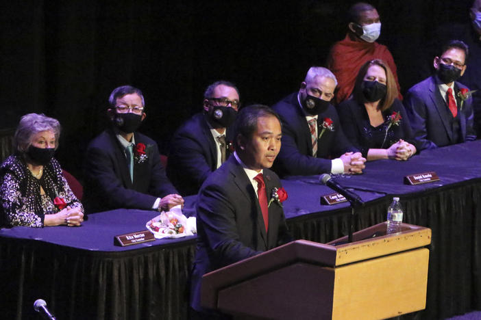 Mayor Sokhary Chau addresses the assembly during the Lowell City Council swearing-in ceremony on Monday in Lowell, Mass.