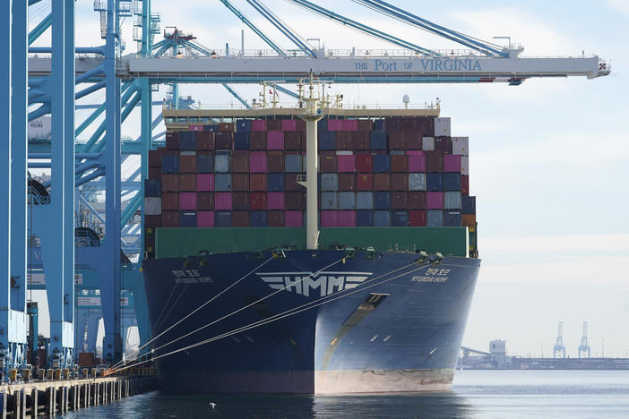 The container ship Hyundai Hope is loaded in Norfolk, Va., on Dec. 1, 2021.