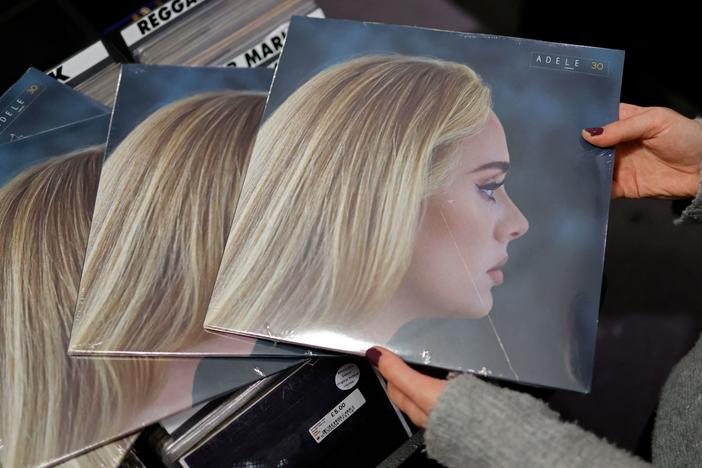 Adele's album <em>30</em> was among 2021's chart-toppers, according to a new, year-end report by MRC Data.