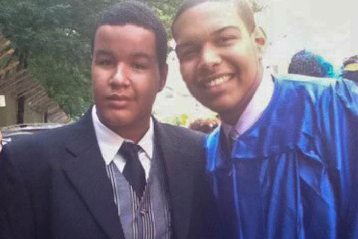 Left to right: Angel Gonzalez and Luis Paulino are seen at Paulino's 2011 high school graduation in New York.