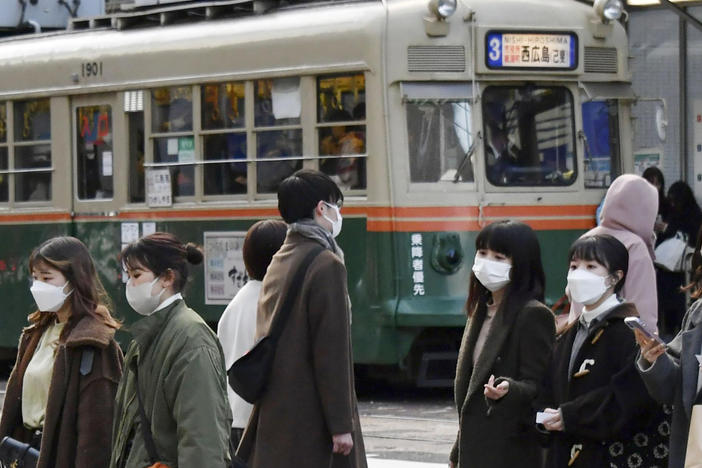 Japan approved new restrictions on Friday to curb a sharp rise in coronavirus cases in the three most affected southwestern regions of Okinawa, Yamaguchi and Hiroshima.