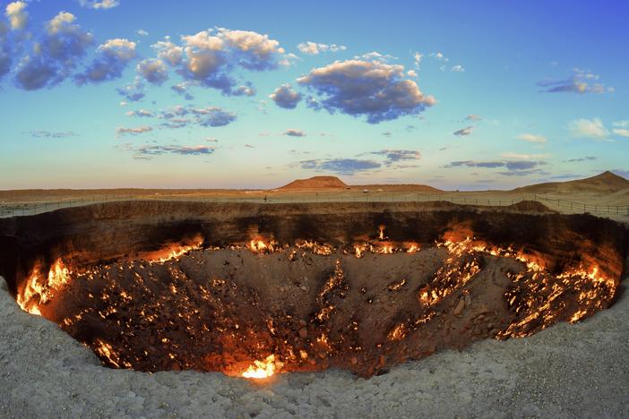 The crater fire named "Gates of Hell" is seen near Darvaza, Turkmenistan, on July 11, 2020. The president of Turkmenistan is calling for an end to one of the country's most notable but infernal sights.