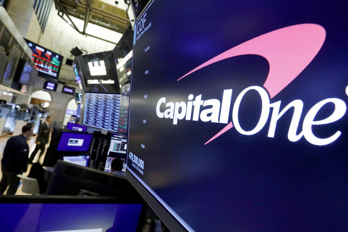 Capital One has become the nation's largest bank to end overdraft fees for all of its customers. Federal regulators are taking a hard look at bank overdraft fees, which hit customers with lower incomes the hardest.