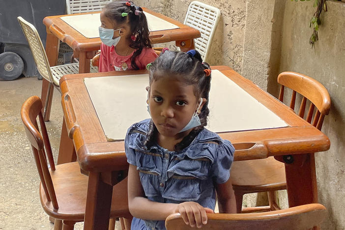 Two of the children who came for a meal at a soup kitchen in Caracas run by the charity Alimenta la Solidaridad. It serves about 100 people and operates Monday through Friday.