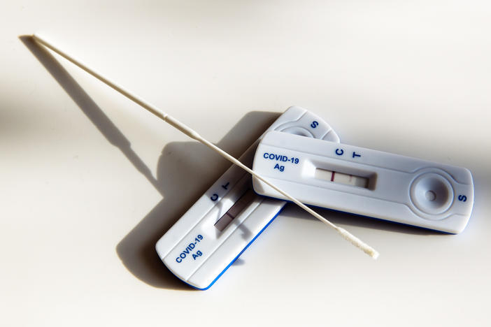 A COVID-19 home test in the U.S. comes with a swab to swirl in the nostrils. But some users say they're swabbing the throat too — even though that's not what the instructions say to do. "They may stab themselves," cautions Dr. Janet Woodcock, acting head of the Food and Drug Administration.