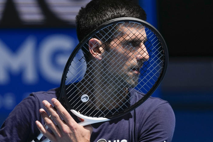 Defending men's champion Novak Djokovic practices ahead of the Australian Open tennis championship in Melbourne, Australia, on Wednesday.