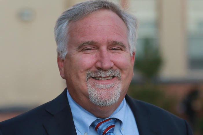 Albuquerque Public Schools superintendent Scott Elder poses outside of Highland High School. Albuquerque Public Schools says classes will be canceled Friday for a second day after a cyberattack.