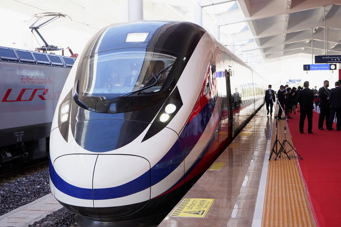 A train is ready on the station during the handover ceremony of the high-speed rail project in Vientiane, Laos, connecting the city with Kunming, China, on Dec. 3, 2021.