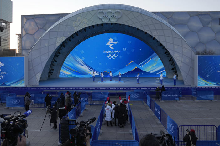 Staff members rehearse a victory ceremony at the Beijing Medals Plaza last week. The venue will host some medal ceremonies at the upcoming winter Olympics.
