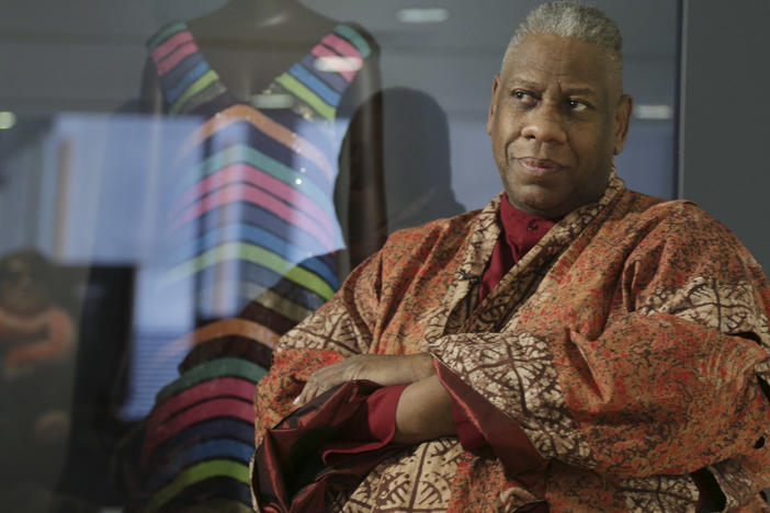 André Leon Talley, a former editor at large for Vogue magazine, speaks to a reporter at the opening of the "Black Fashion Designers" exhibit at the Fashion Institute of Technology in New York on  Dec. 6, 2016.