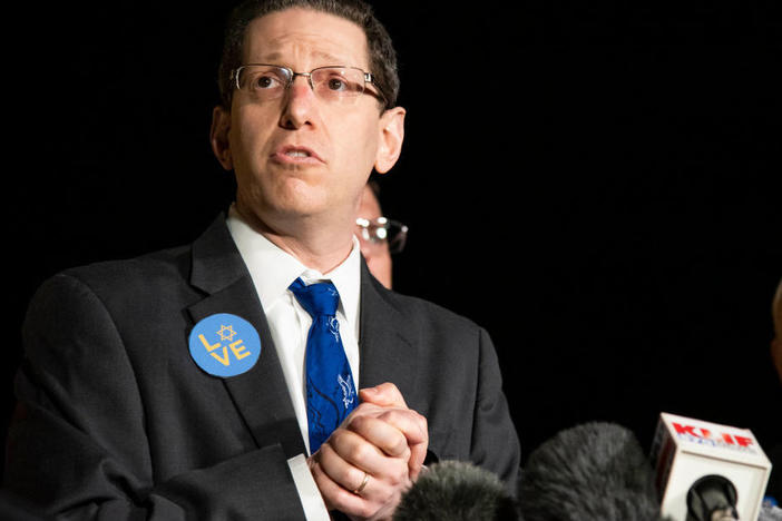 Rabbi Charlie Cytron-Walker talks to reporters following a special service arranged days after a 44-year-old British national held the rabbi and three others hostage inside the Congregation Beth Israel synagogue in Colleyville, TX.