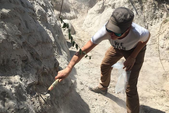 Céline Vidal uncovering the ash layer above Omo 1 remains at Omo-Kibish.