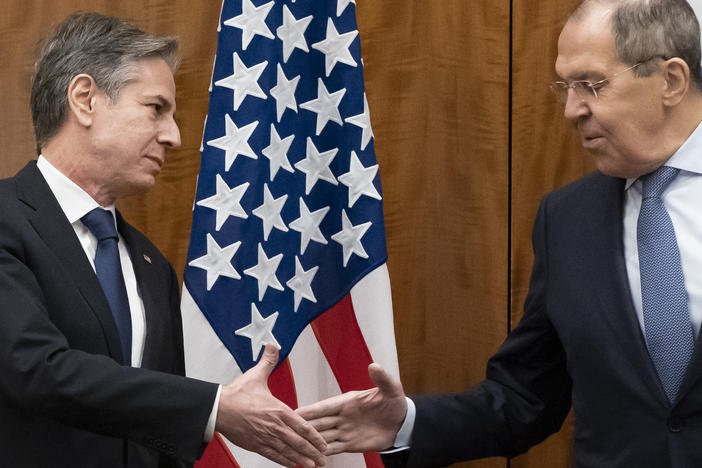 U.S. Secretary of State Antony Blinken greets Russian Foreign Minister Sergey Lavrov before their meeting on Friday in Geneva.