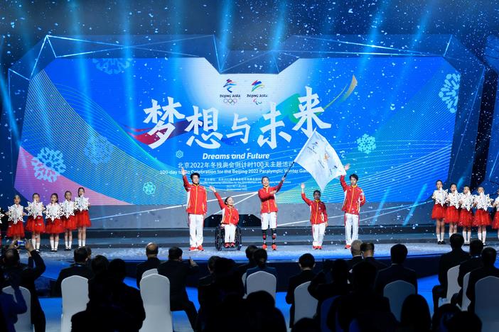 People attend the Beijing 2022 Paralympic Winter Games 100 Day countdown event at the National Aquatic Center in Beijing, China, on Nov. 24, 2021.