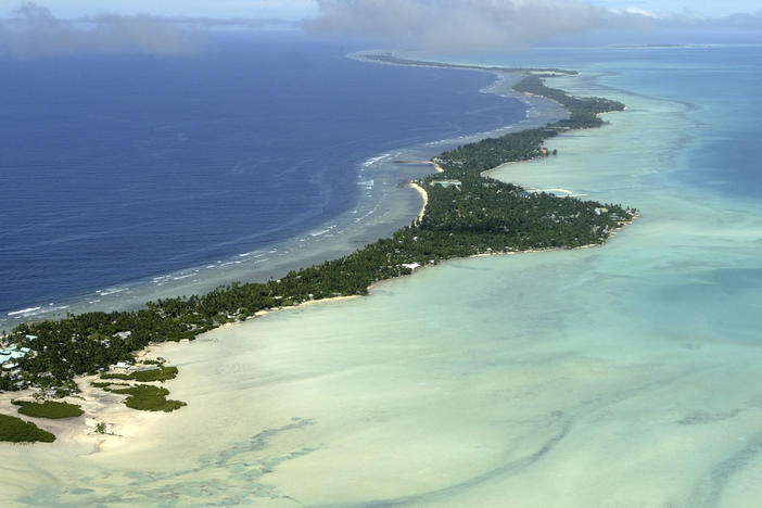 Tarawa atoll, Kiribati, is pictured in 2004. The Pacific island nations of Kiribati and Samoa have announced rare COVID-19 lockdowns after dozens of international travelers tested positive for the virus.