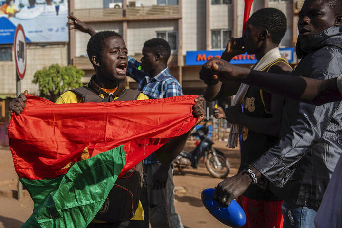 Protestors take to the streets of Burkina Faso's capital Ouagadougou Saturday Jan. 22, 2022, 27, 2021.