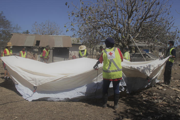Red Cross teams set up a temporary shelter in Kanokupolu, western Tongatapu, on Friday as the Tonga island group grapples with the aftermath from the recent underwater volcanic eruption.