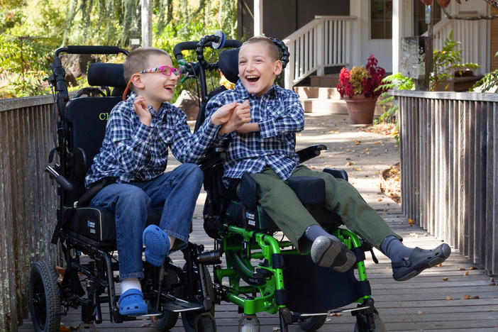 Brothers Chase Miller (left), 10, and Carson Miller, 11, in November 2021. The two brothers have a rare genetic disorder and are immunocompromised. Their family has to practice extreme caution to prevent coronavirus exposures.