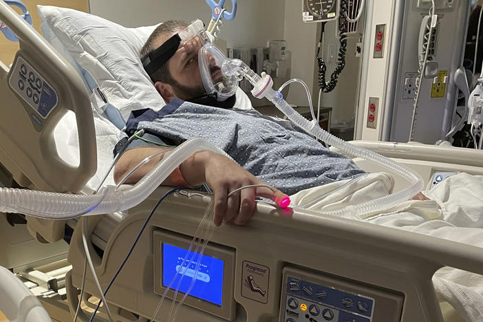 This family photo shows D.J. Ferguson initially being treated at Milford, Mass., Regional Medical Center. Brigham and Women's Hospital in Boston is defending itself after Ferguson's family claimed he was denied a new heart for refusing to be vaccinated against COVID-19.
