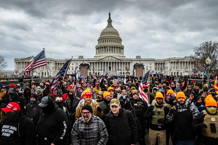 Pro-Trump protesters gather in front of the U.S. Capitol Building on January 6, 2021 in Washington, DC. A pro-Trump mob stormed the Capitol, breaking windows and clashing with police officers.