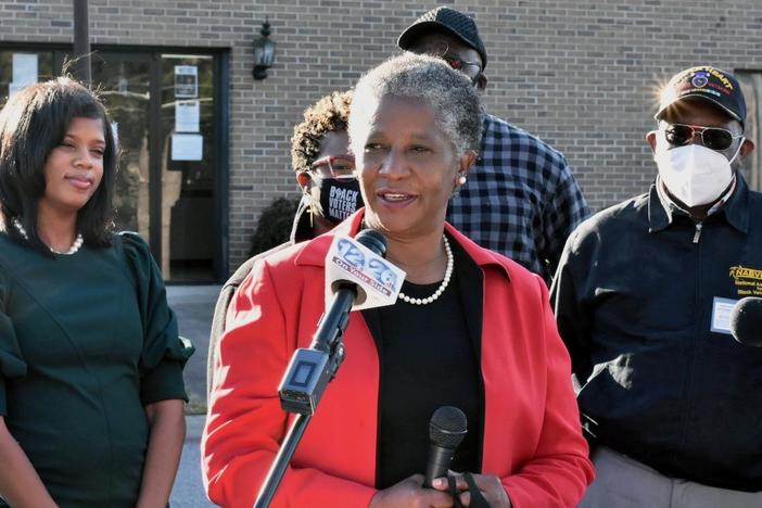 Denise Freeman (center), a former Lincoln County Board of Education member and community activist, calls a plan to consolidate polling places in the rural Georgia county "unconscionable."
