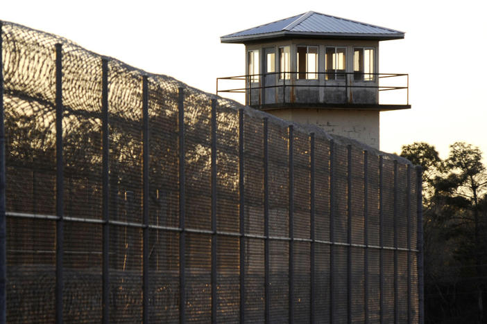 The sun sets behind Holman Prison in Atmore, Ala., on Thursday as the U.S. Supreme Court cleared the way for the execution of Matthew Reeves, convicted of killing a man during a robbery in 1996.