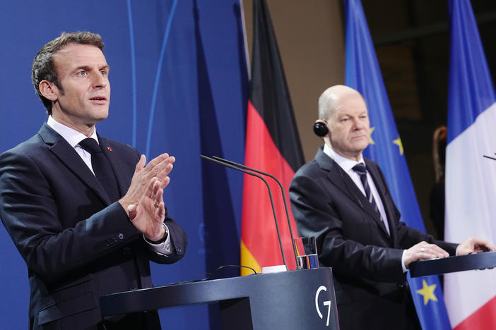 German Chancellor Olaf Scholz and French President Emmanuel Macron give a joint press conference ahead of talks at the Chancellery on Tuesday in Berlin.