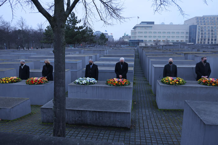 Public officials including Israeli Knesset President Mickey Levy, German President Frank-Walter Steinmeier and German Chancellor Olaf Scholz attend a wreath-laying ceremony on International Holocaust Remembrance Day at the Memorial to the Murdered Jews of Europe on Thursday in Berlin.