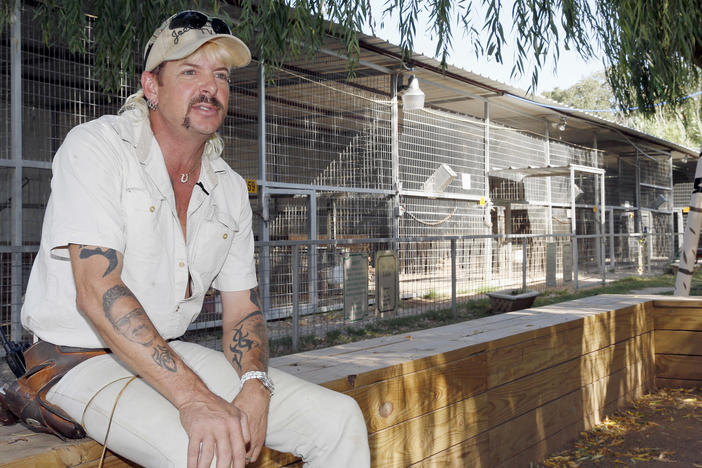 A judge in Oklahoma City took a year off the 22-year prison sentence of Joe Exotic, seen here in 2013, who was convicted in a murder-for-hire plot against his rival Carole Baskin.