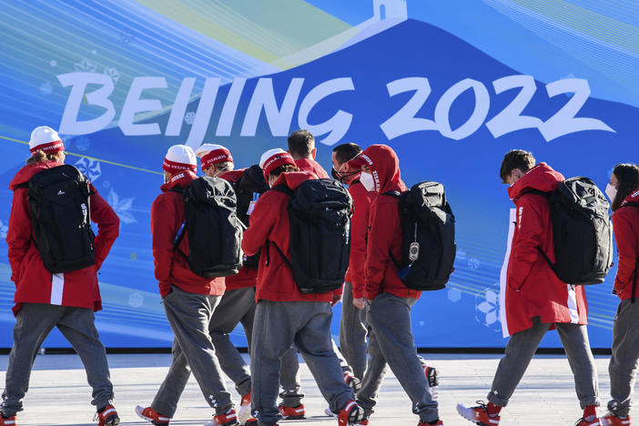 Members of Team Switzerland arrive at the Olympic Village ahead of the Beijing 2022 Winter Olympic Games on Feb. 1, 2022.