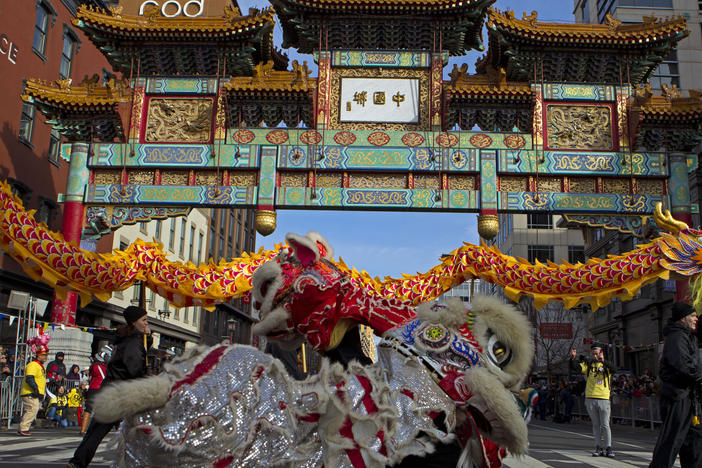 Dancers perform lion and dragon dances during Lunar New Year celebrations in Washington, D.C.'s Chinatown in 2019.