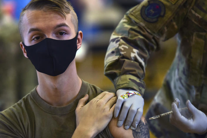The first COVID-19 mass vaccination on Joint Base Pearl Harbor-Hickam in Hawaii is held on Feb. 9, 2021. The Army says it will "immediately begin separating Soldiers from the service" who refuse to be vaccinated.