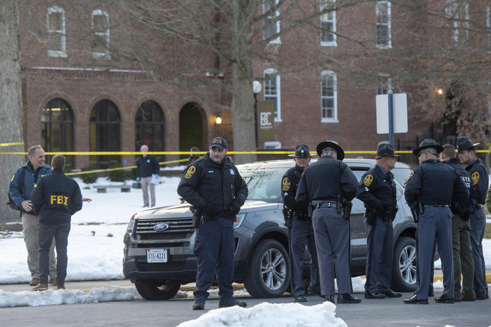 Police conduct an investigation after a shooting at Bridgewater College in Virginia on Tuesday.